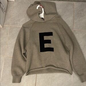 Fear of God Kids Tan Hoodie with Black Letter